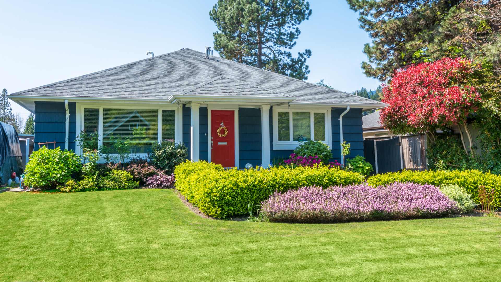 Maintained lawn and landscaping by Ankeny near Bondurant, IA.