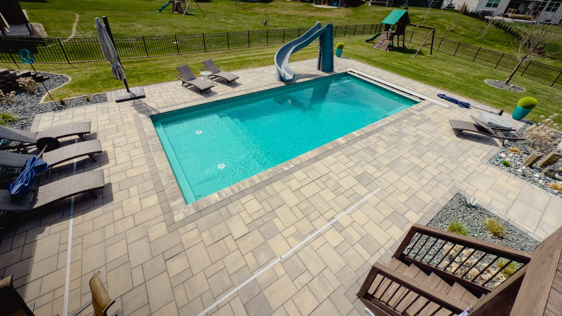 Pool Installation Project in Ankeny, IA, With Paver Patio & Fire Pit