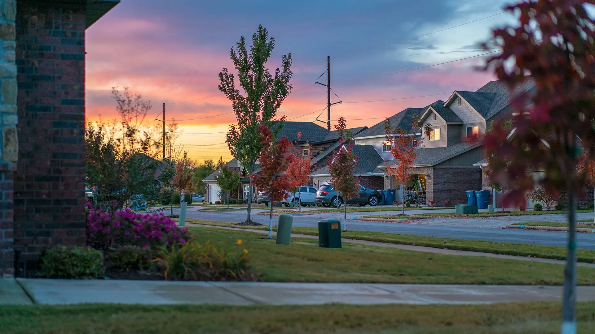 Sunset sky shown in a neighborhood in Huxley, IA.