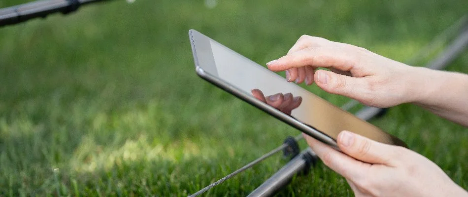 Monitoring irrigation system from a smart tablet in Ankeny, IA.