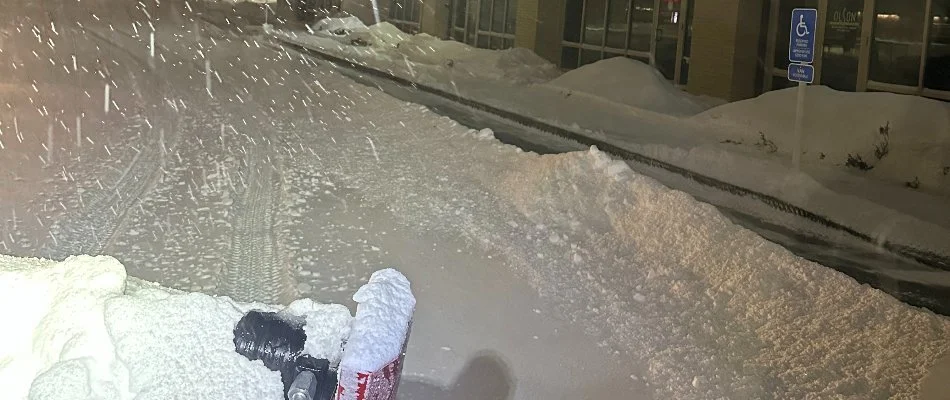 Thick snow and plow in Ankeny, IA.