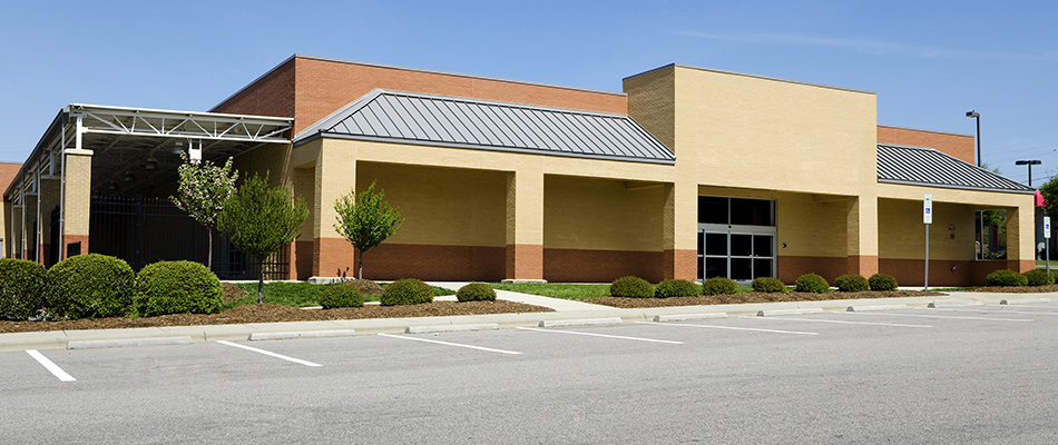 A commercial property with a striped parking lot in Polk City, IA.