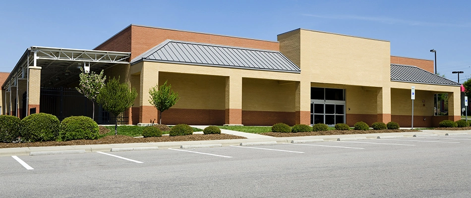 A commercial property with a striped parking lot in Polk City, IA.