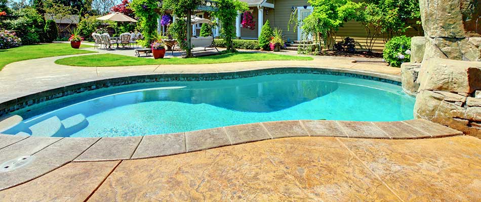 Custom pool in a back yard near Saylorville, IA.