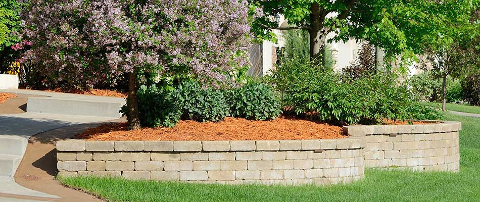 Custom retaining wall installed at a home in Clive, IA.