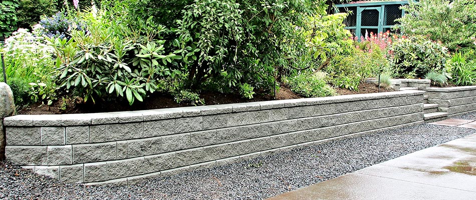 Custom stone retaining wall constructed in Ankeny, IA.