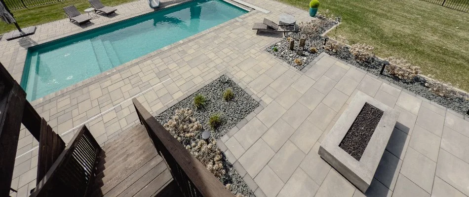 Deck view of a patio area with a fire pit in Ankeny, IA.