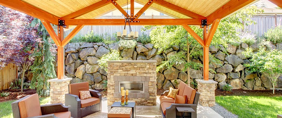 Outdoor living area with a custom fireplace in Ankeny, IA.