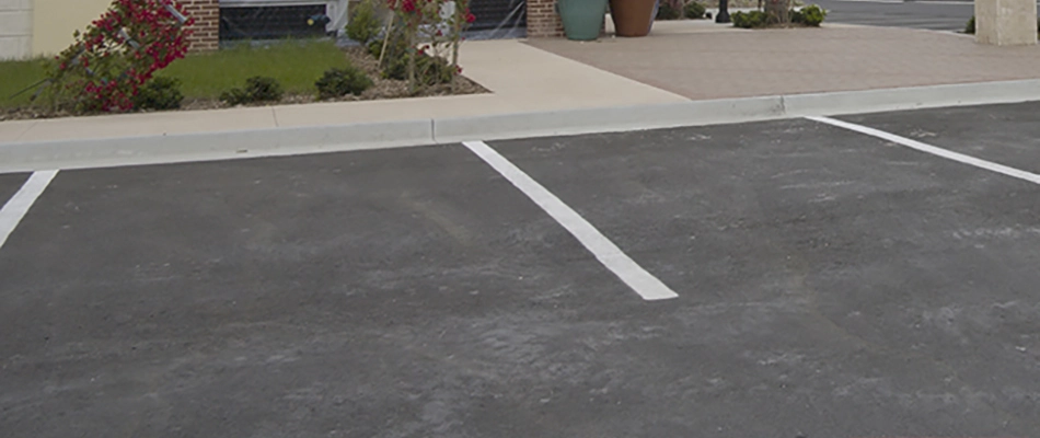 Parking lot striped for a commercial property in Polk City, IA.