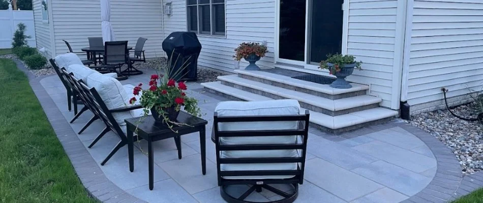 Patio area with steps and furniture in North Liberty, IA.