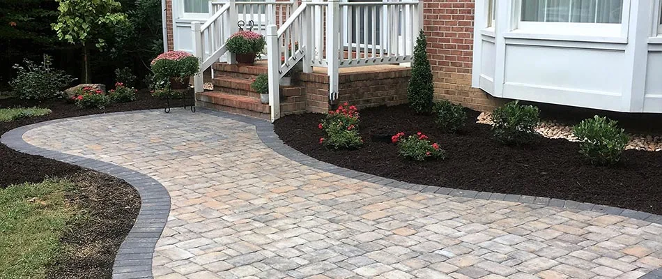 Paver walkway leading to a home's front door in Elkhart, IA.