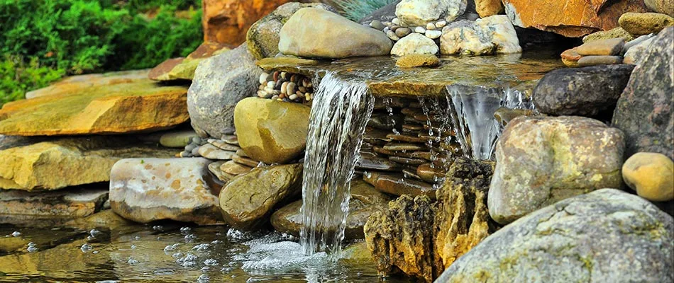 Beautiful, serene water fall water feature at a home in Ankeny, IA.