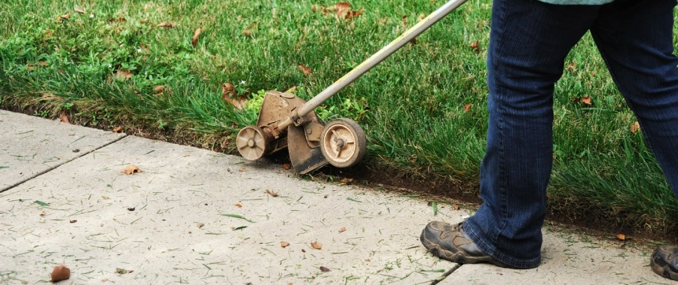 Professional edging lawn in Bondurant, IA.