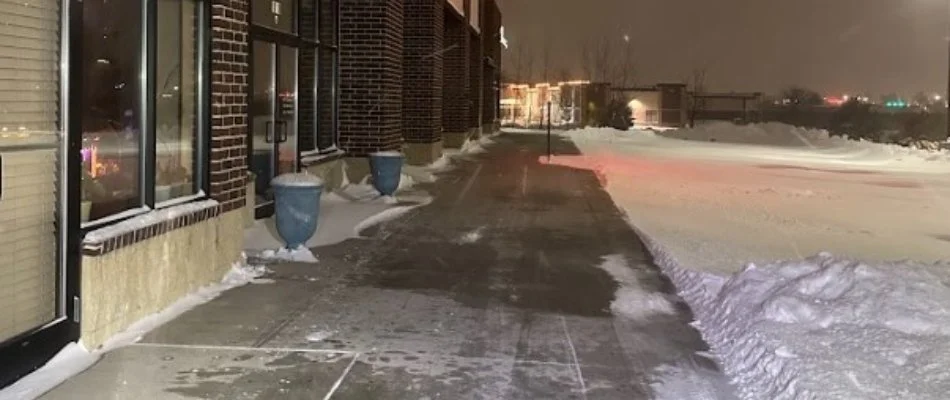 Snow cleared from walkway on a commercial property in Ankeny, IA.