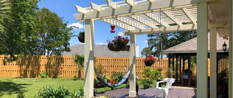 White Pergola In Backyard